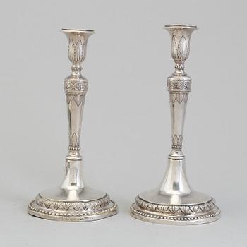 A pair of Italian early 19th century candlesticks, mark of Naples 1804.