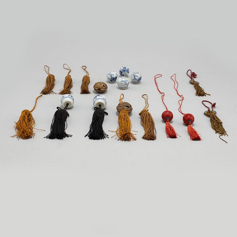 Eight (6+2) tassles, porcelain and bronze, Japan, 20th century.