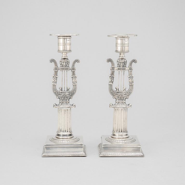 A pair of silver candle sticks by Adolf Zethelius, Stockholm 1821.