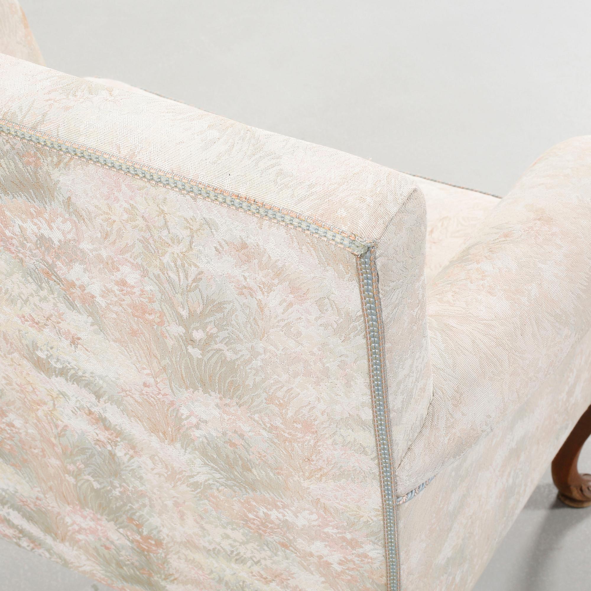 A Queen Anne style armchair, early 20th century.