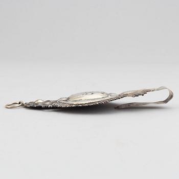 A pair of 19th century silver curtain tie-backs.