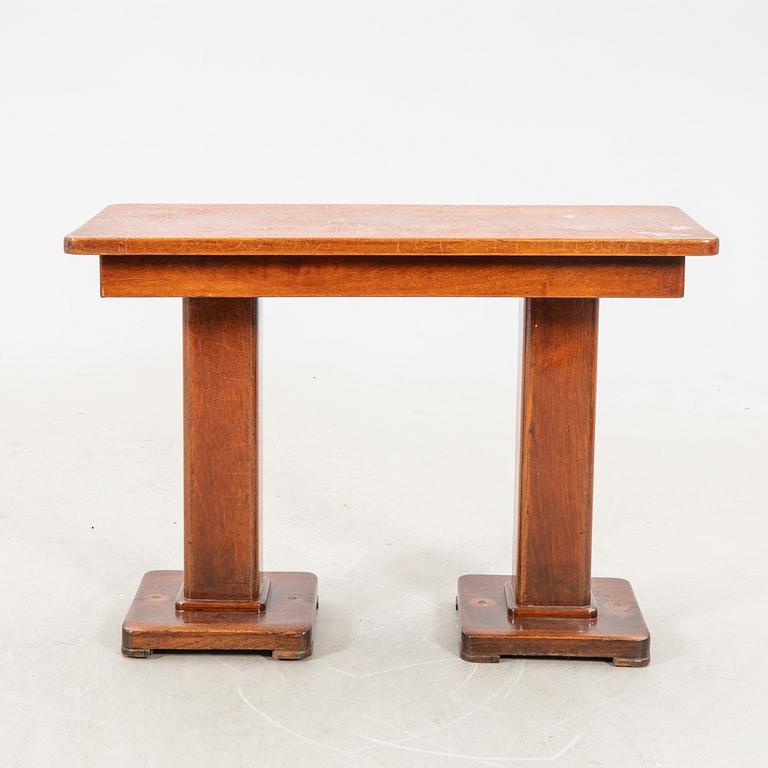 A set of table and two benches from a ship 20th century.