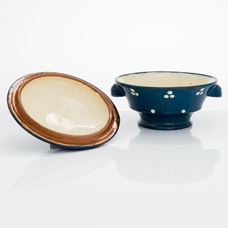 ALFRED WILLIAM FINCH, A serving bowl with lid around 1900 by Iris Finland.