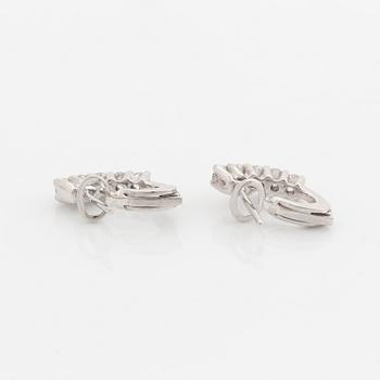 Brilliant-cut diamond earrings.