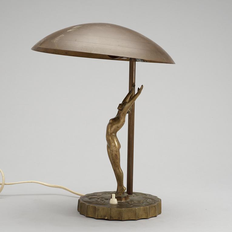 A bronze table lamp.