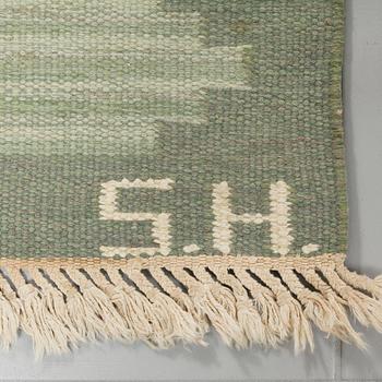 A SWEDISH FLATWEAVE, SIGNED SH, 230 x 165 cm.