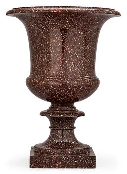 654. A Swedish Empire porphyry urn.