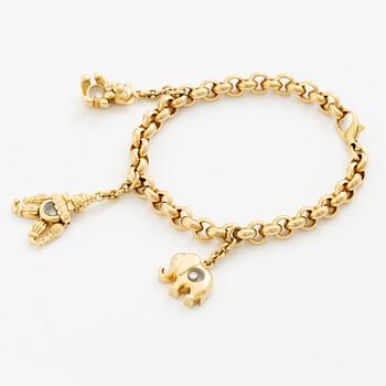 Chopard armband med berlocker 18K guld med runda briljantslipade diamanter.