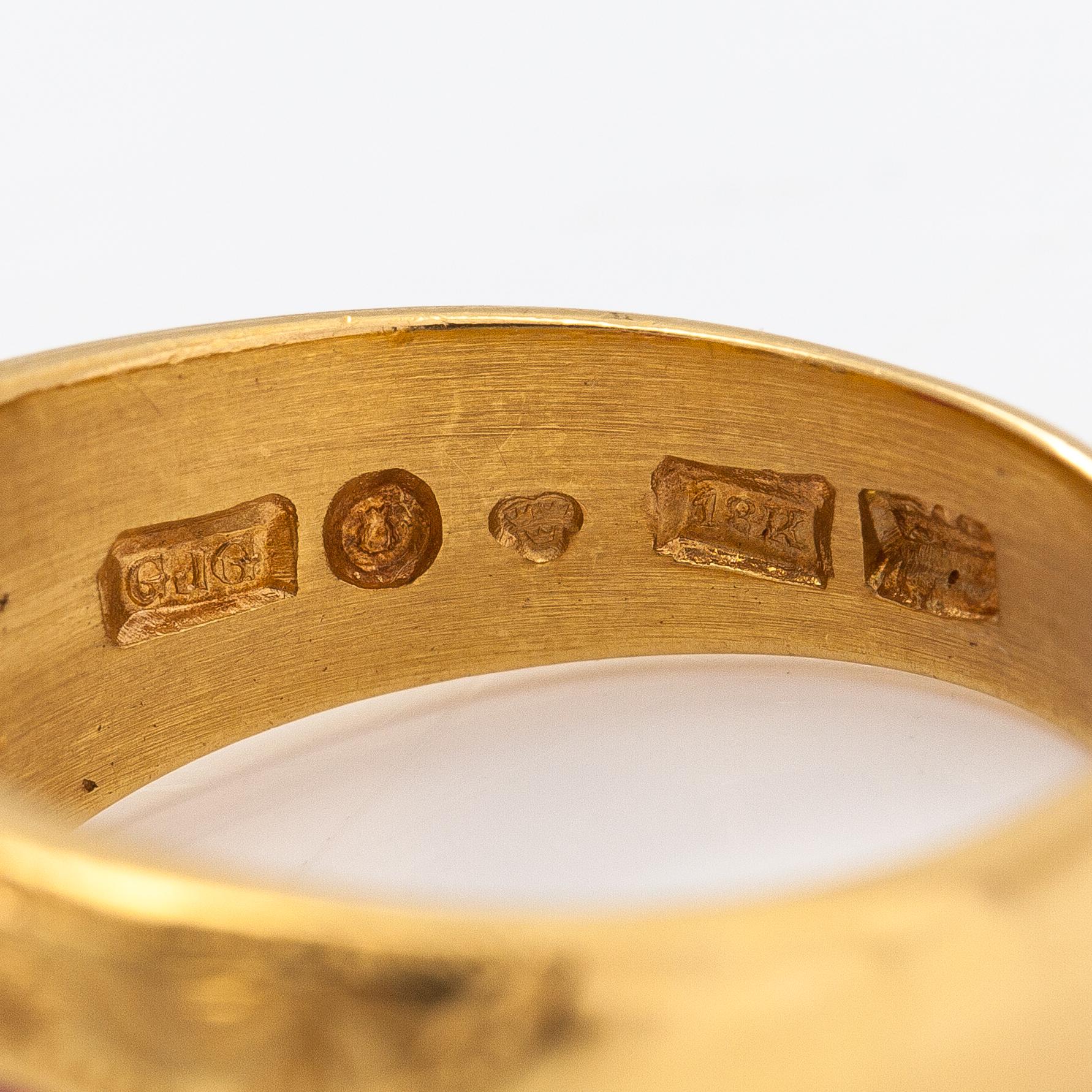 An 18K gold ring with a ca 0.35 ct diamond and rubies. Jurgen Girgsdies Juvel-Guldsmedja, Västerhaninge.