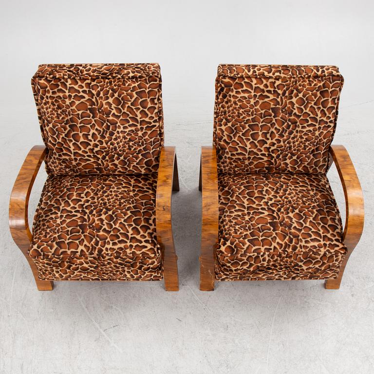 A pair of armchairs, mid-20th Century.