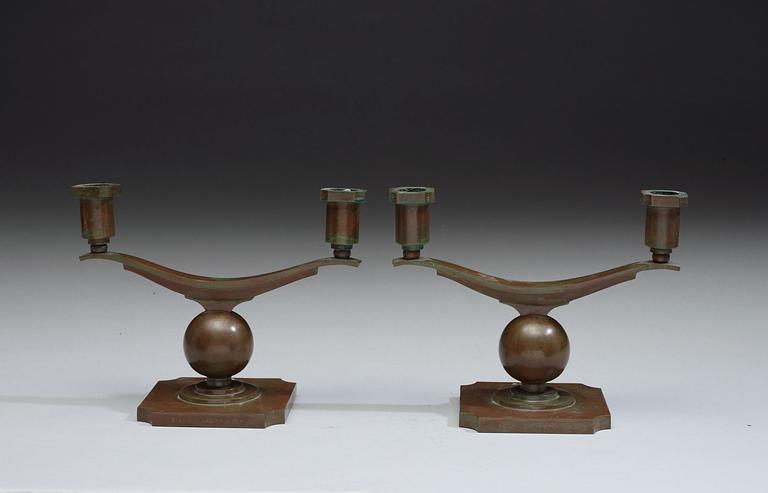A pair of Sune Bäckström bronze candelabra, Sweden 1920's-1930'.