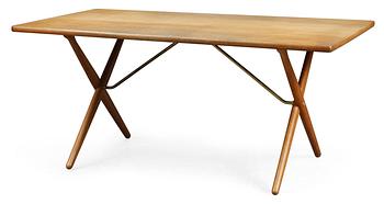 73. A Hans J Wegner oak dinner table by Andreas Tuck, Denmark 1950's-60's.