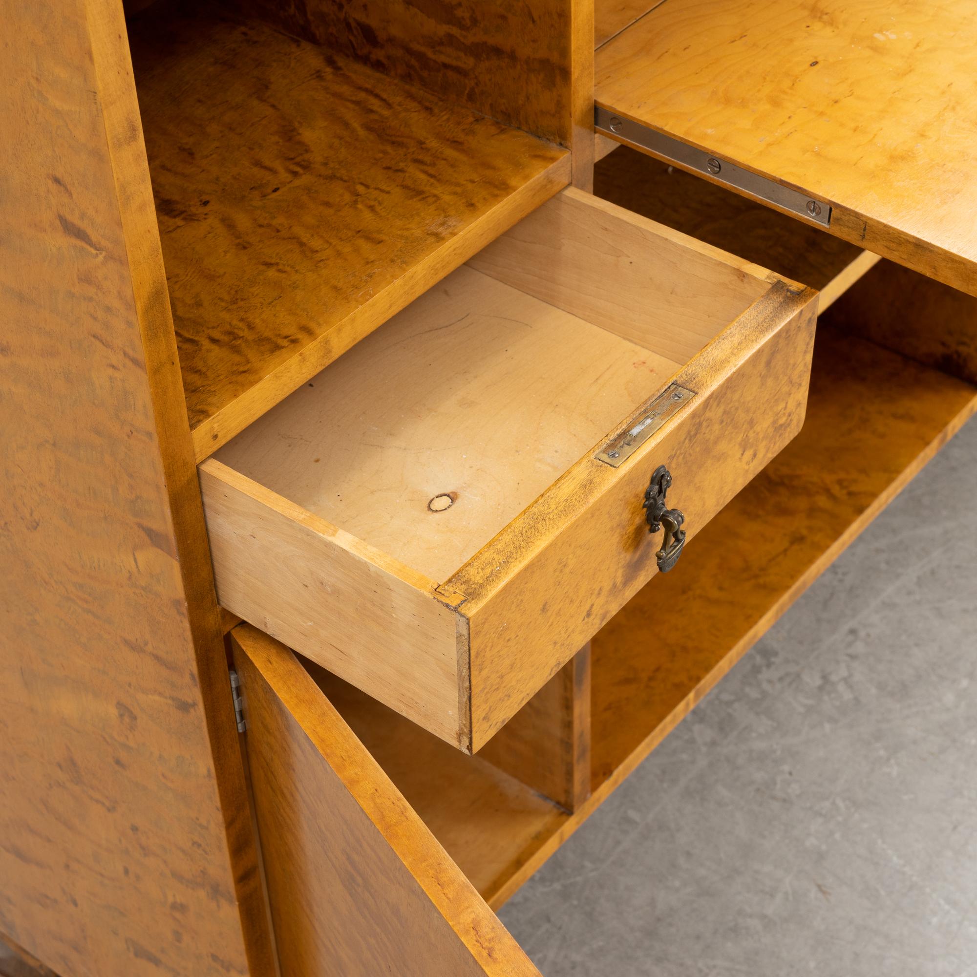 A 1930's birch veneered bookcase/sideboard.