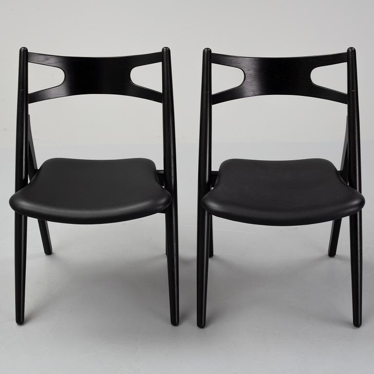 Hans J Wegner,  four 'CH29P Sawbuck' chairs, Carl Hansen, 2007.