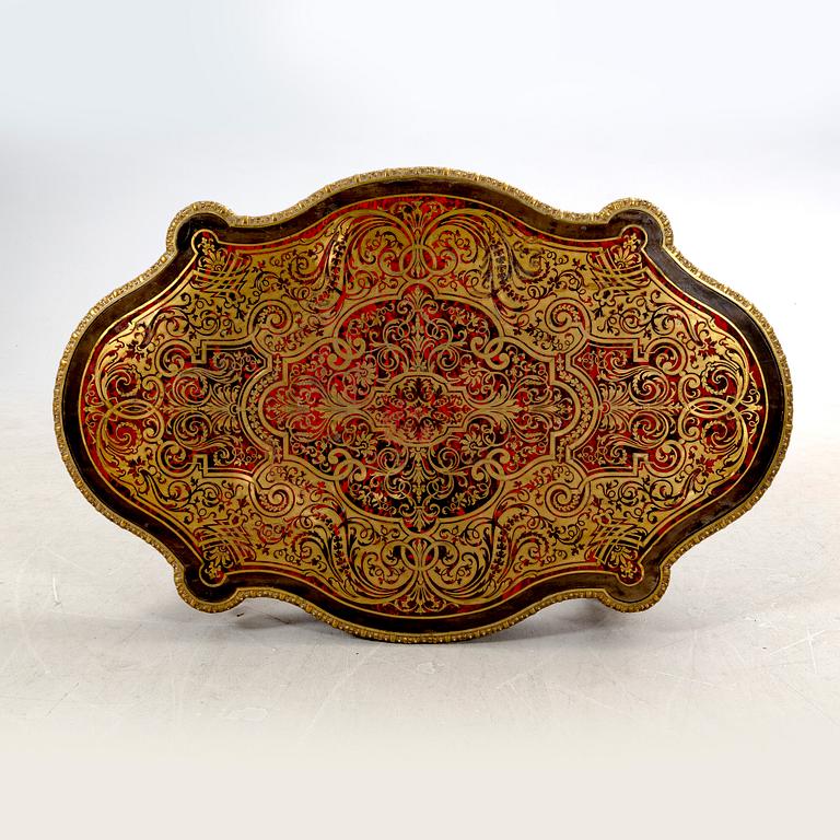 A Boulle style table around 1900.