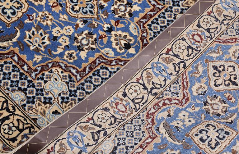 A carpet,  Nain, part silk, so-called 9 LAA, approx. 382 x 99 cm.