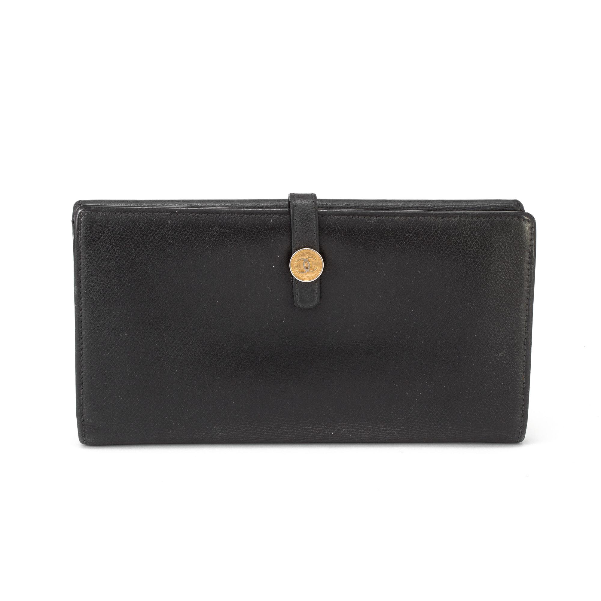 A black leather wallet by Chanel 2004/2005.