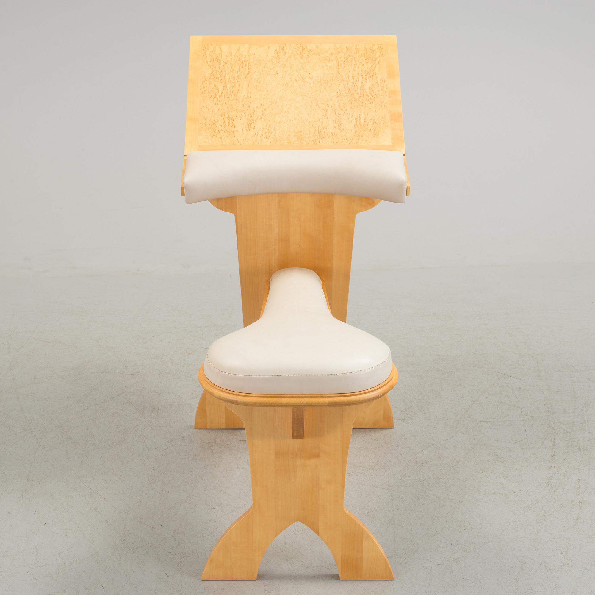 a "plugghästen" chair by Peter Lind.