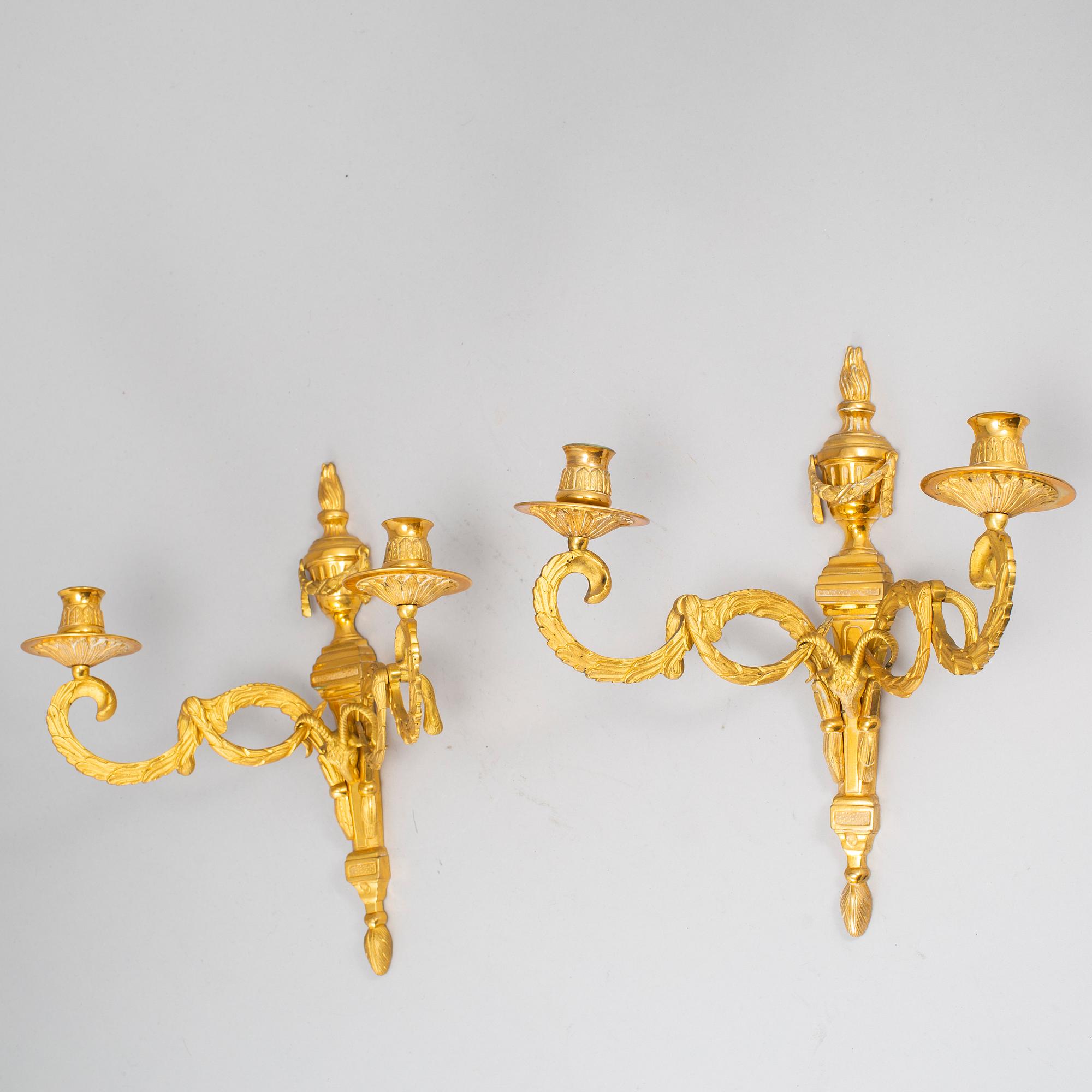 A 20th Century pair of Louis XVI style wall sconces.