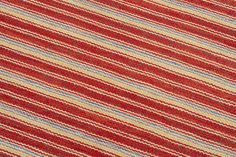 A flat weave carpet, c. 256 x 158 cm.