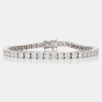 1156. A 9.40 ct brilliant-cut diamond bracelet.