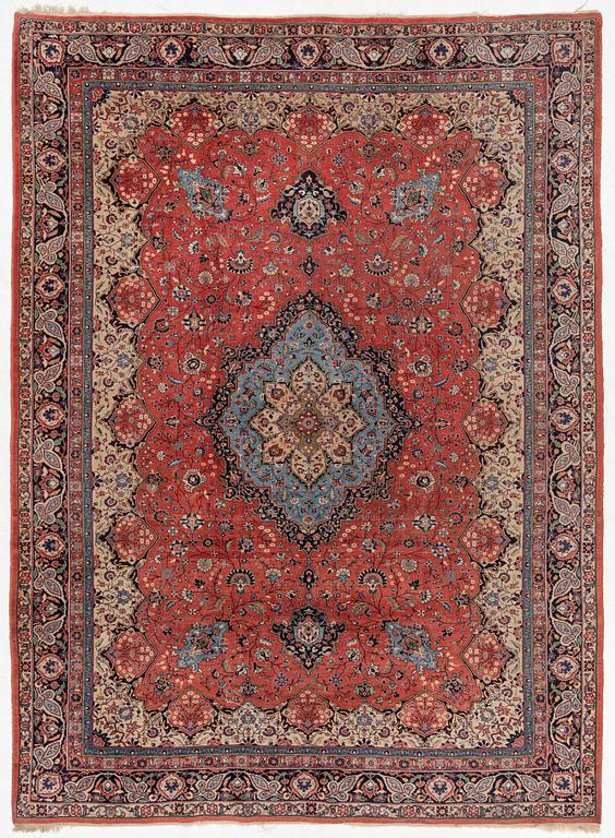 An oriental carpet, c. 370 x 275 cm.
