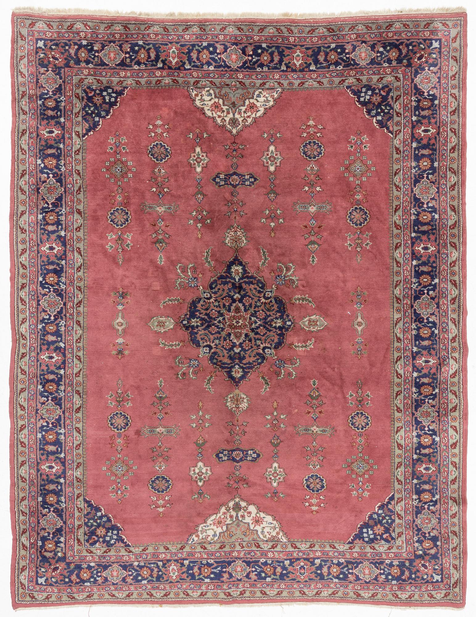 An oriental/eastern European carpet, c. 355 x 275 cm.