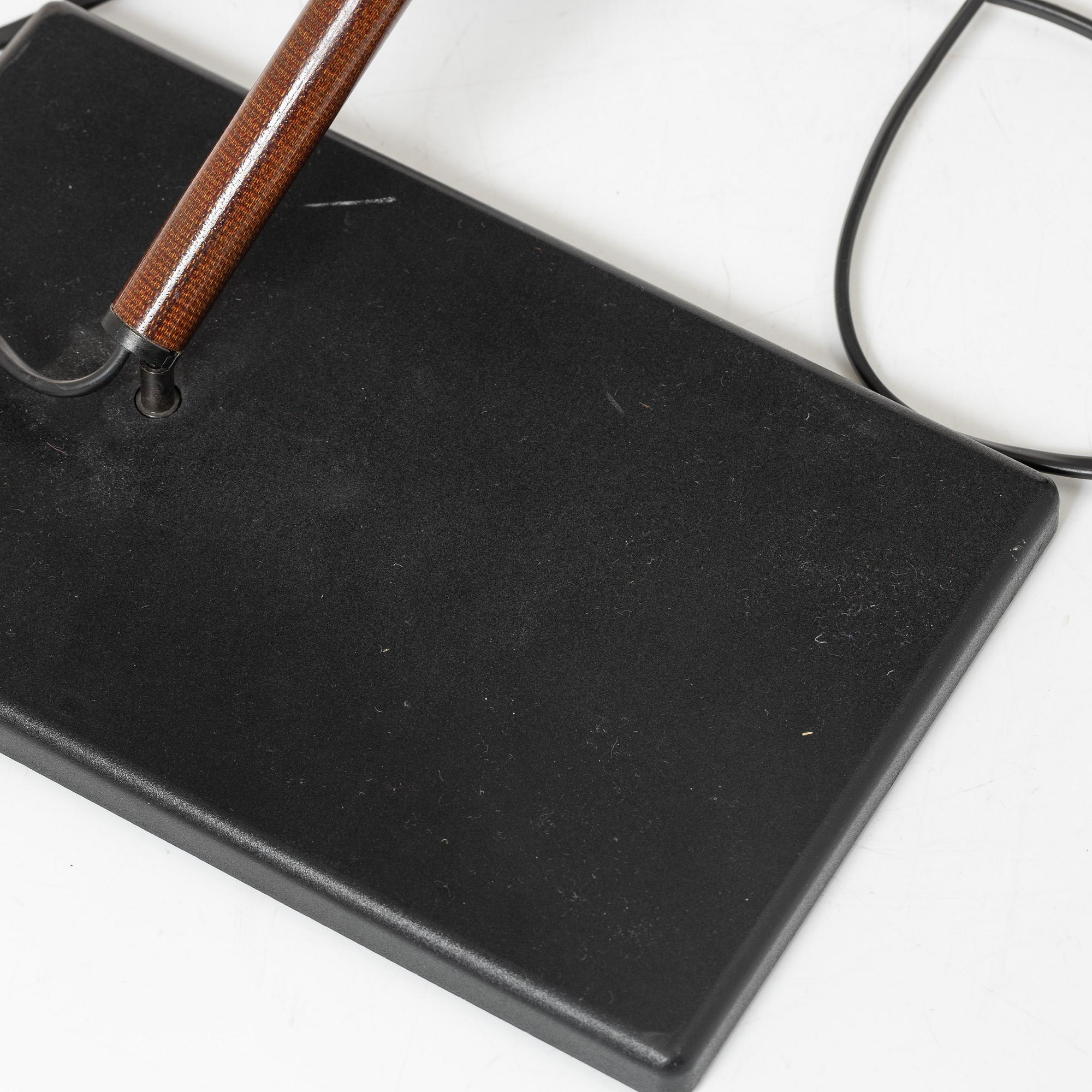 Paolo Rizzatto, a model 612 table lamp from Arteluce, Italy.