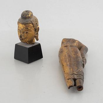 Two Thai gilt wooden fragments of figurines, late 19th century.