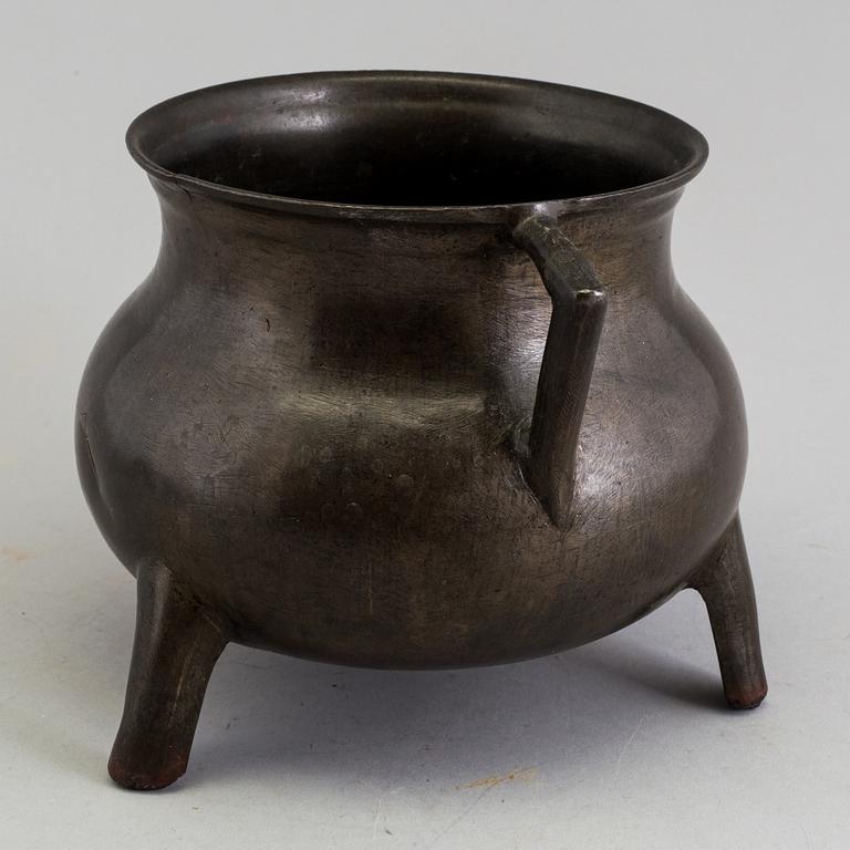 A medieval bronze pot.