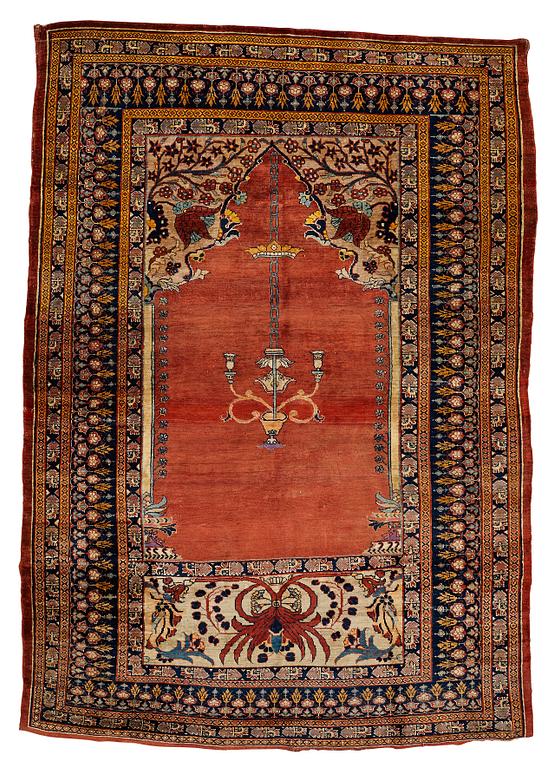 A rug, an antique silk Heriz, ca 166,5-170 cm x 116-120 cm.