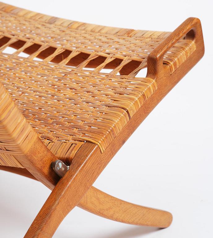 Hans J. Wegner, a foldable easy chair model 512, Johannes Hansen, Copenhagen, 1950s-60s.
