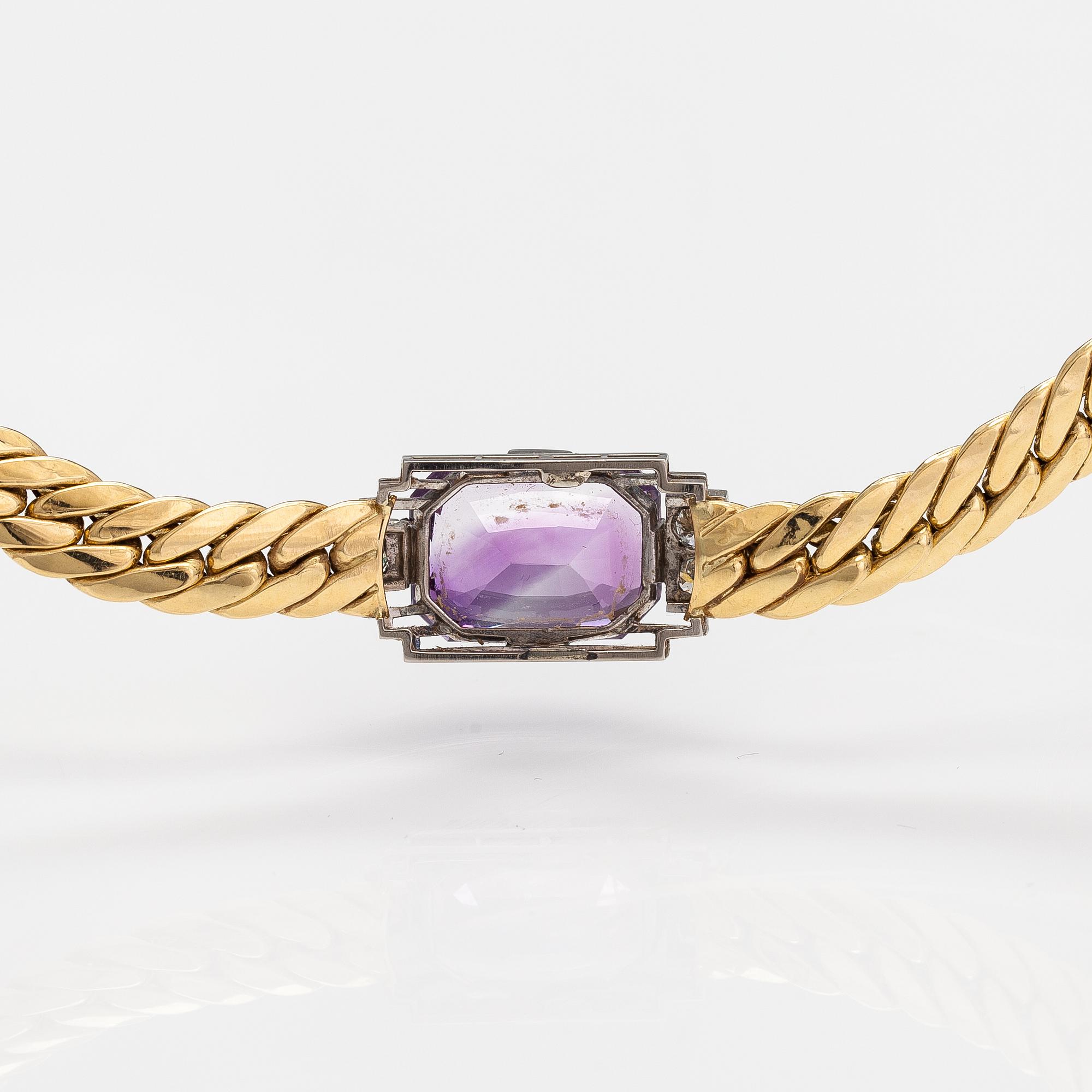 An 18K gold necklace with an amethyst and diamonds ca. 0.63 ct in total. Torbjörn Tillander, Helsinki 1994.