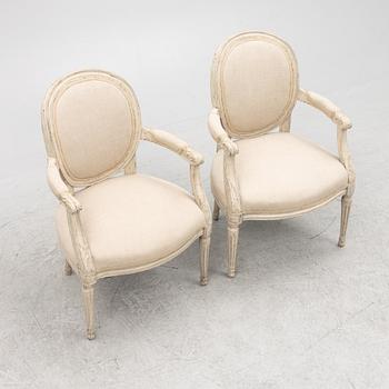 A pair of Gustavian style chairs, circa 1900.