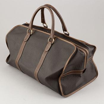 Dunhill, a coated canvas weekendbag.