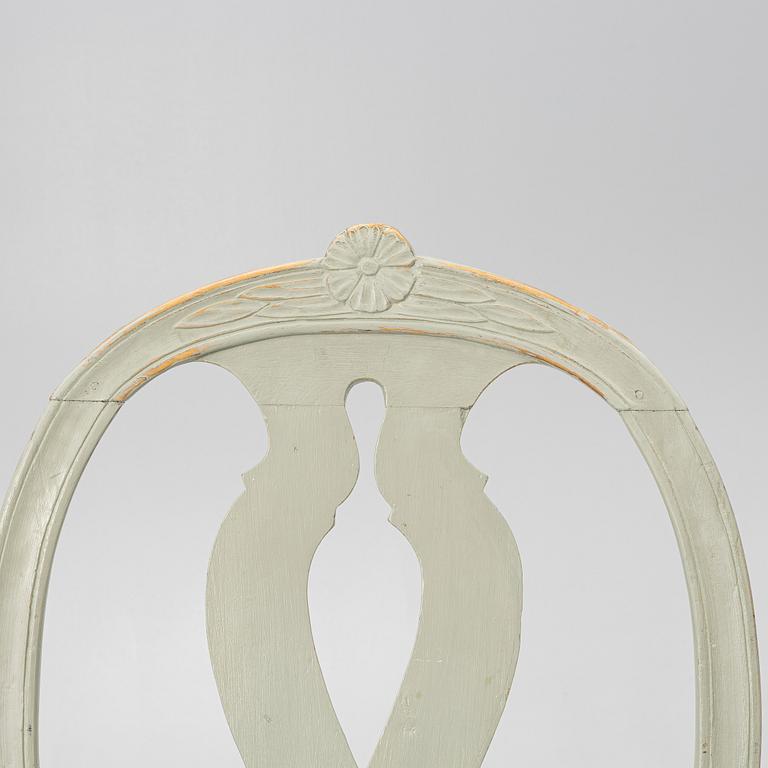 Ten similar Gustavian chairs, Sweden, around the year 1800.
