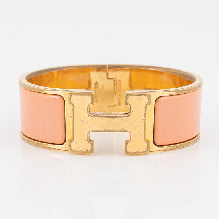 Hermès, a 'Clic Clac H' bracelet.