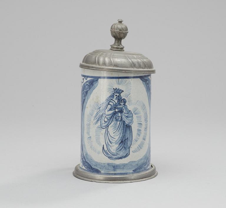 A faience and pewter jug. 18th century.