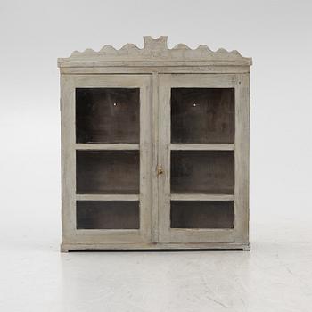 A wall cabinet, 19th Century.