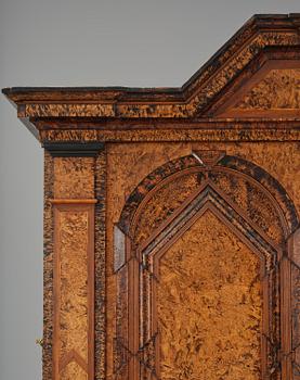 A Swedish late baroque burr-alder cabinet, first part 18th century.