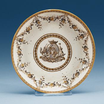 813. A Marieberg soft paste armorial saucer, dated 1781.
