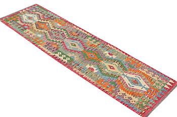 A runner carpet, Kilim. c. 289 x 81 cm.