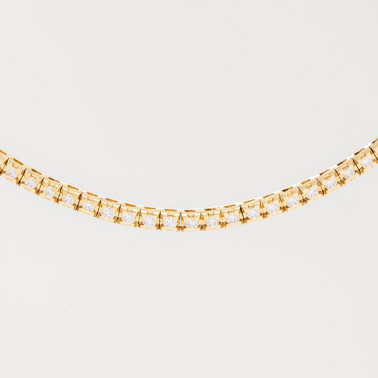 Collier, rivieré, 18K guld med briljantslipade diamanter. Corvino, Italien.