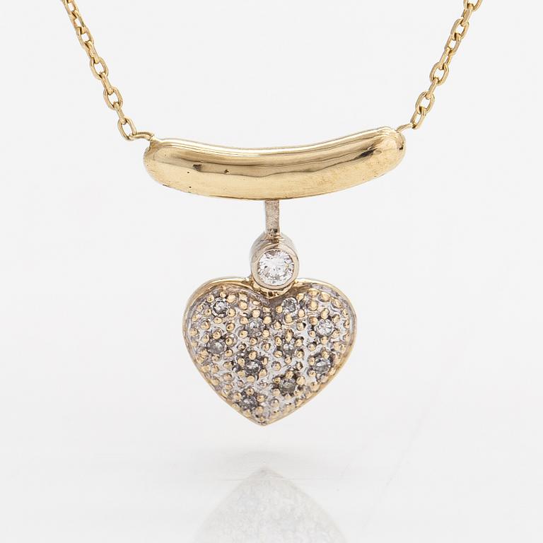 A 14K gold necklace with diamonds ca. 0.08 ct in total.