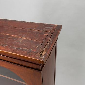 An Empire cabinet, circa 1810.