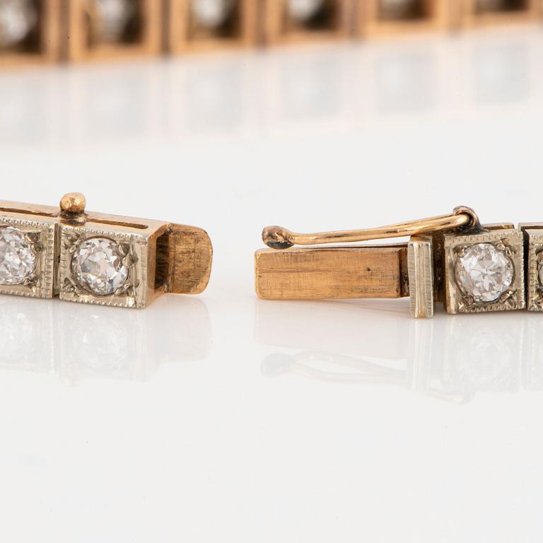 A 14K gold bracelet set with old-cut diamonds.