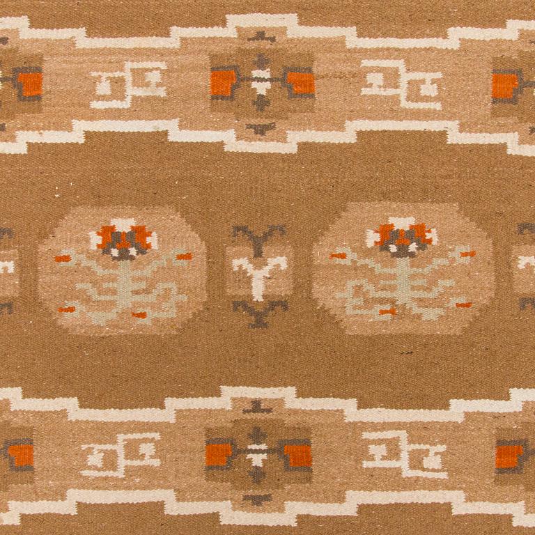 A finnish flat weave carpet 'What shall I do?', manufacturer Laura Korpikaivo-Tamminen. Circa 350 x 260 cm.