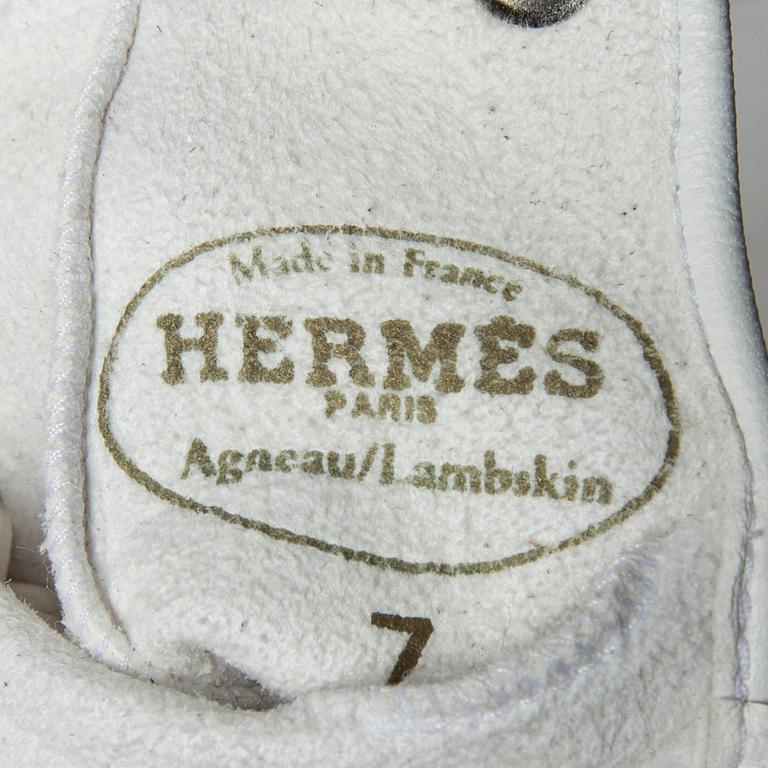 HANDSKAR, Hermès.