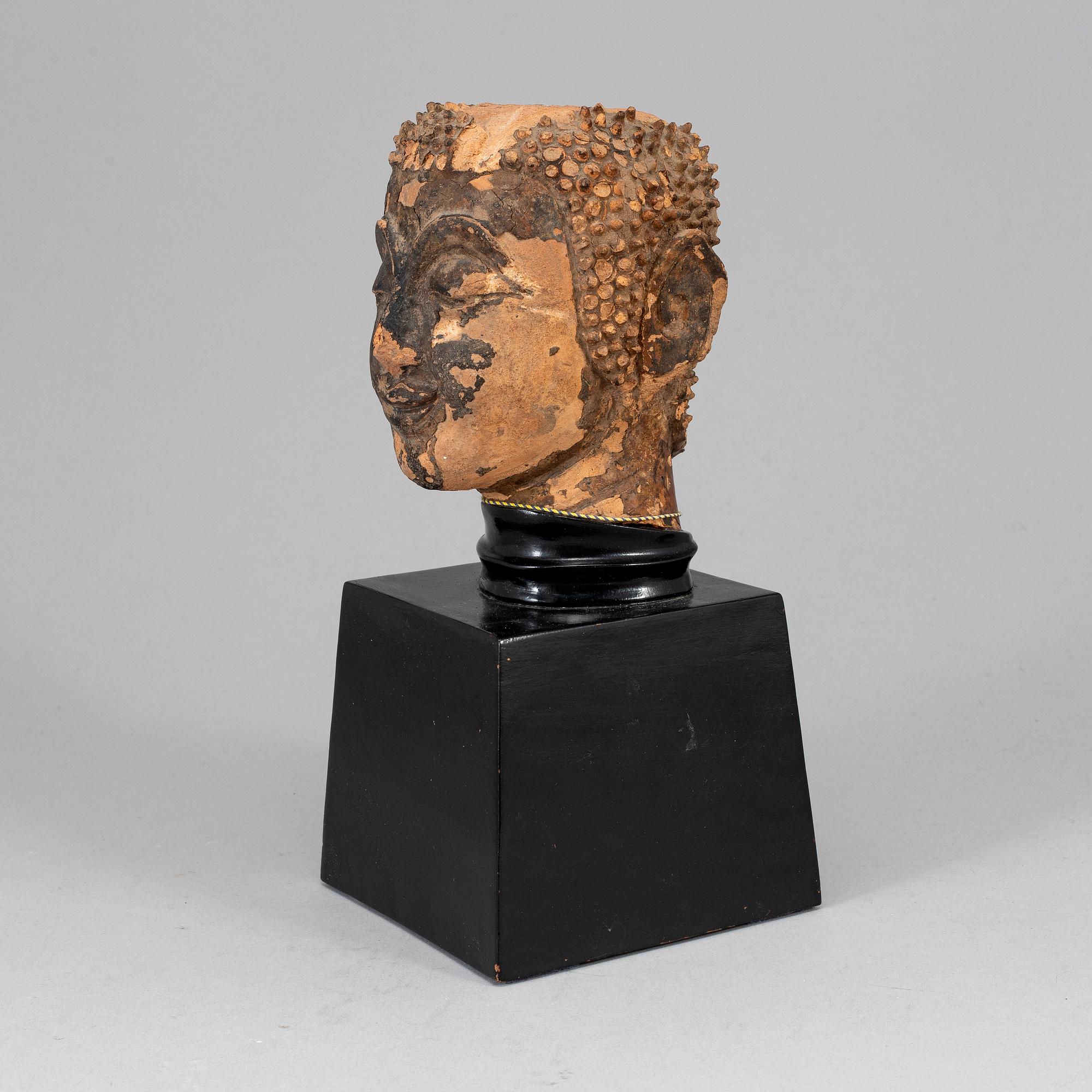 Scultpure of Buddhas head, probably Thailand, 19th Century.