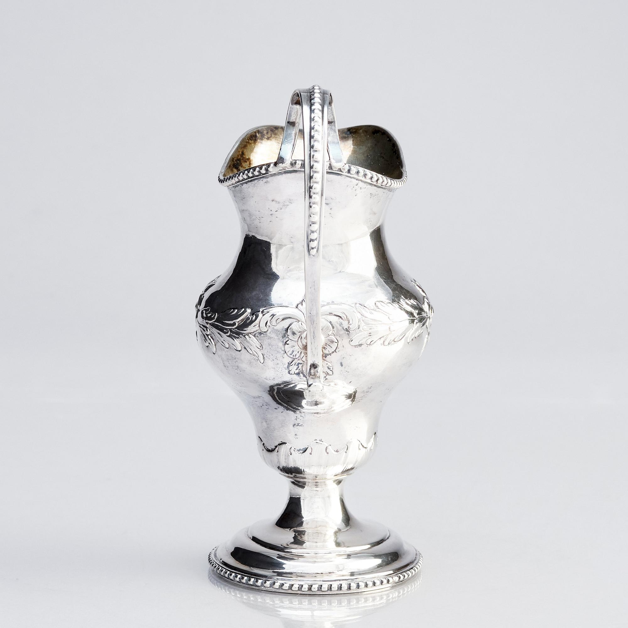 A Swedish 18th century silver cream-jug, 
mark of Johan Malmstedt, Göteborg (1783-1831).